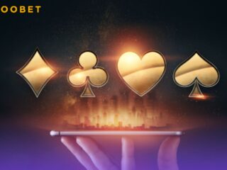 An image of the card suits found above a smartphone